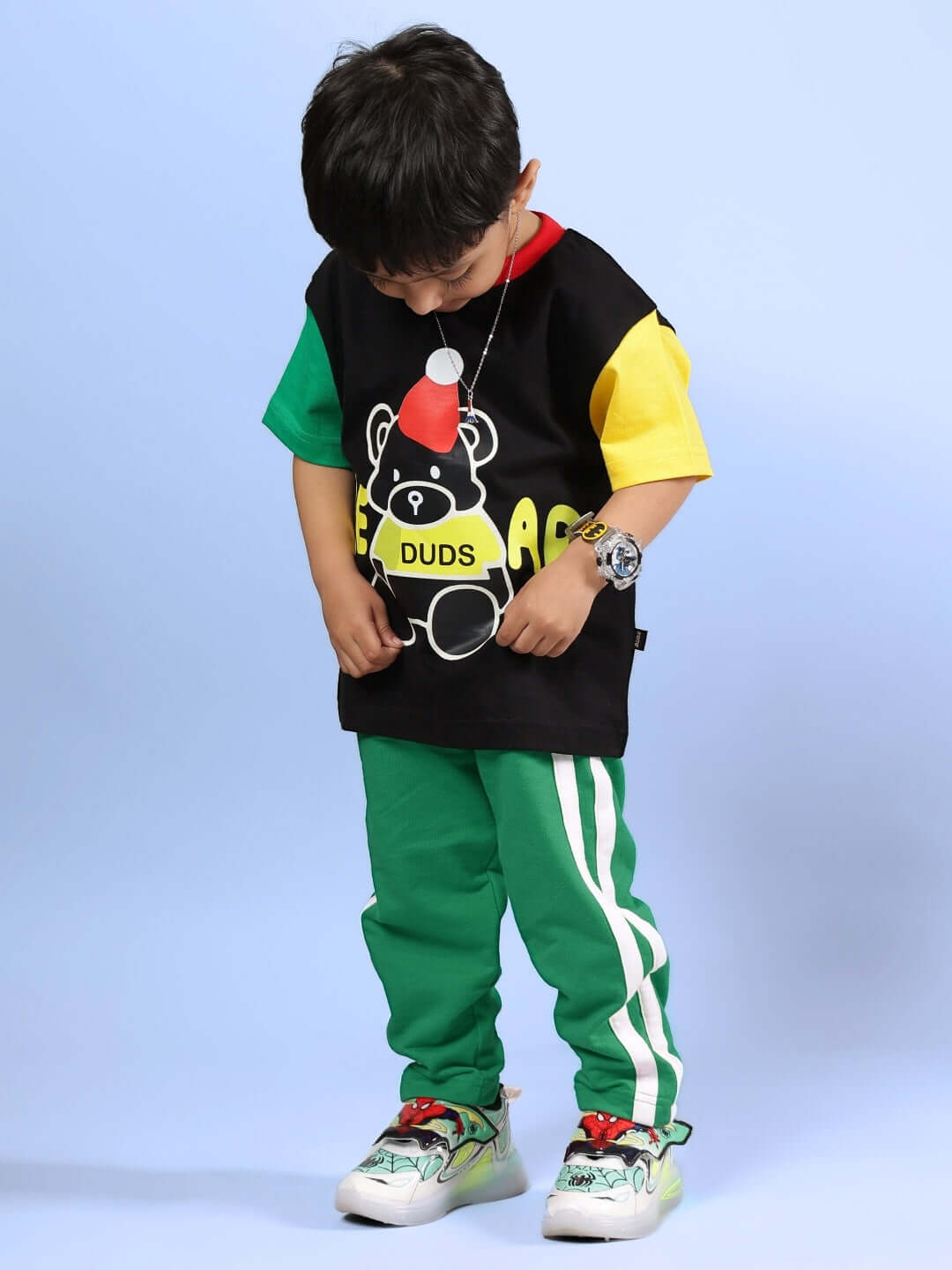 MOCHA CO-ORD FOR BOYS & GIRLS BLACK GREEN outfit featuring a playful design with a colorful top and green striped pants for kids.