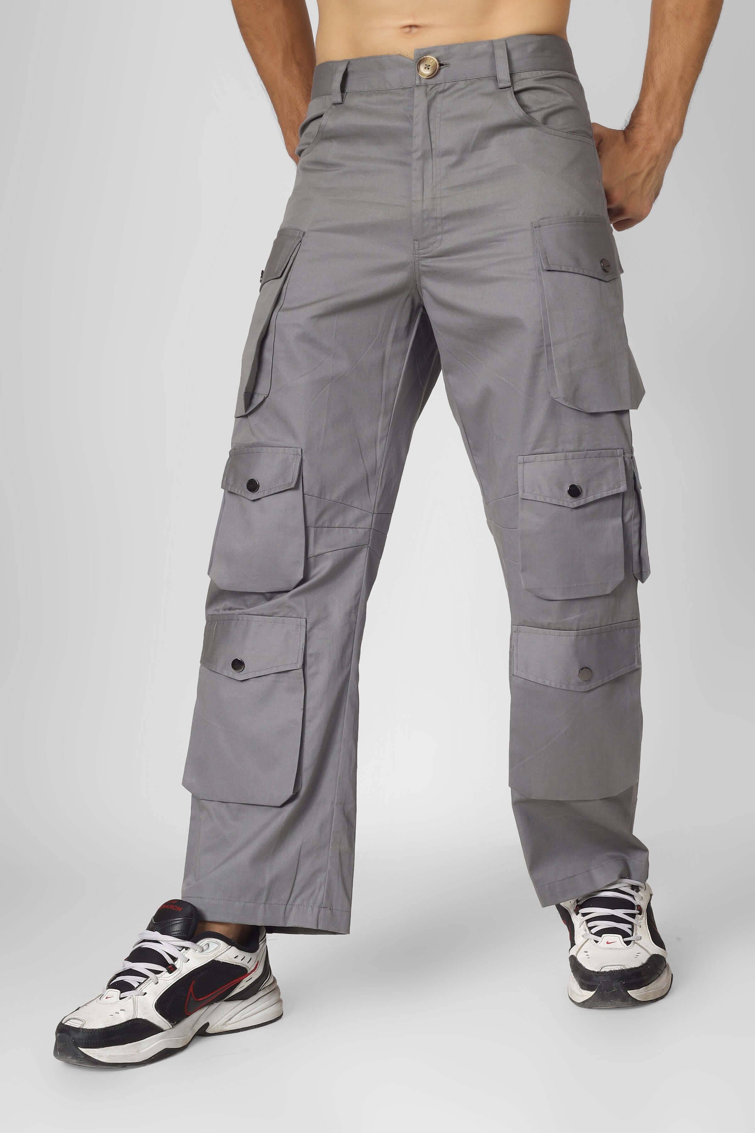 Men's Moon Stone Cargo Pants with 12 pockets, customizable fit options, made to order by DUDS, shown with sneakers.
