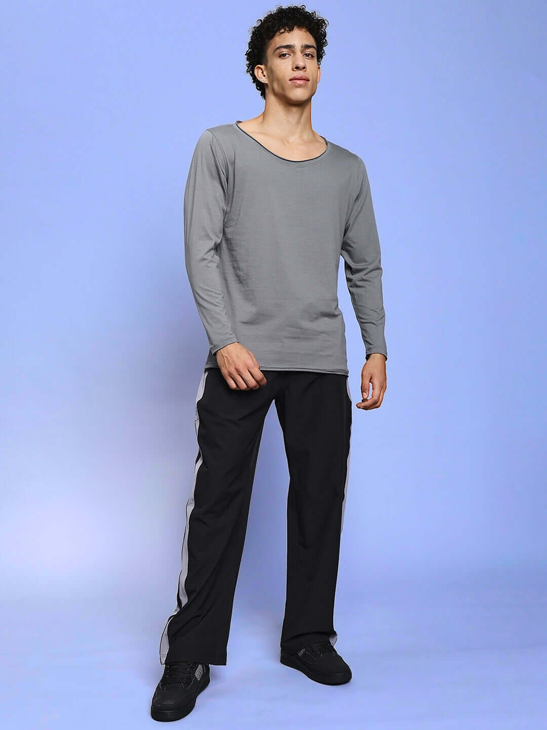 Model wearing Morgan Relaxed Fit Cargo Pant in black, featuring comfortable design perfect for customization and everyday wear.