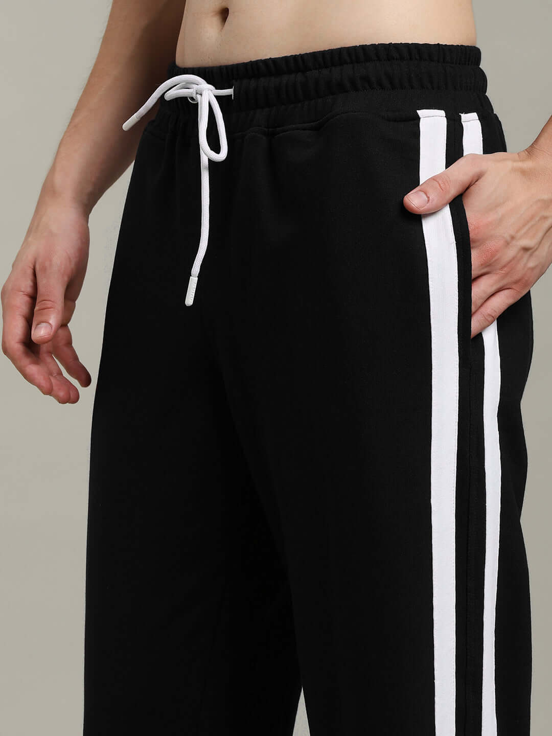 MOSCOW RELAXED FIT JOGGERS BLACK with white stripes, comfortable for casual wear and lounging.