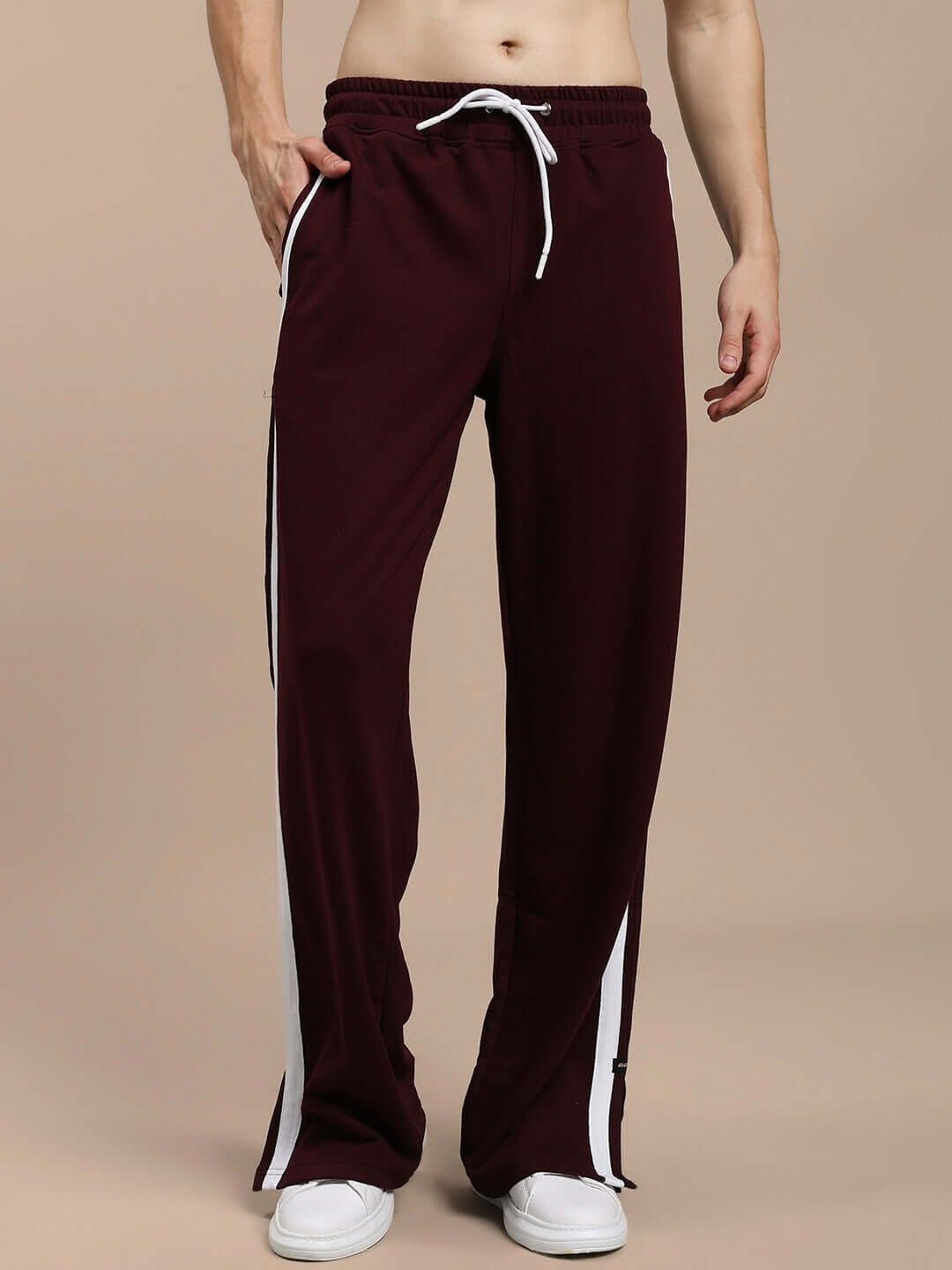 MOSCOW RELAXED FIT JOGGERS MAROON on model, showcasing comfortable and stylish design ideal for lounging and casual outings.