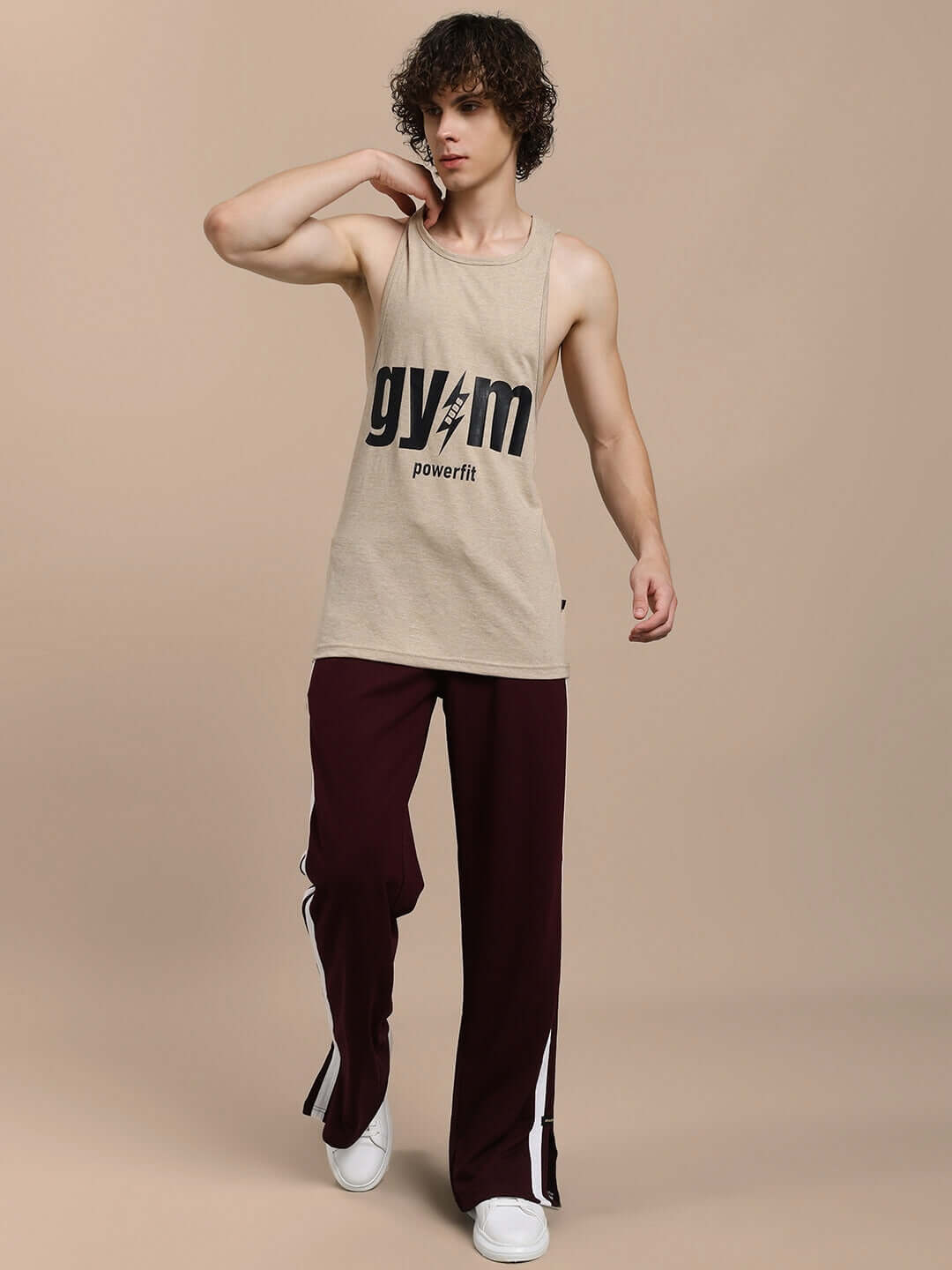 Model wearing MOSCOW RELAXED FIT JOGGERS MAROON standing in a pose