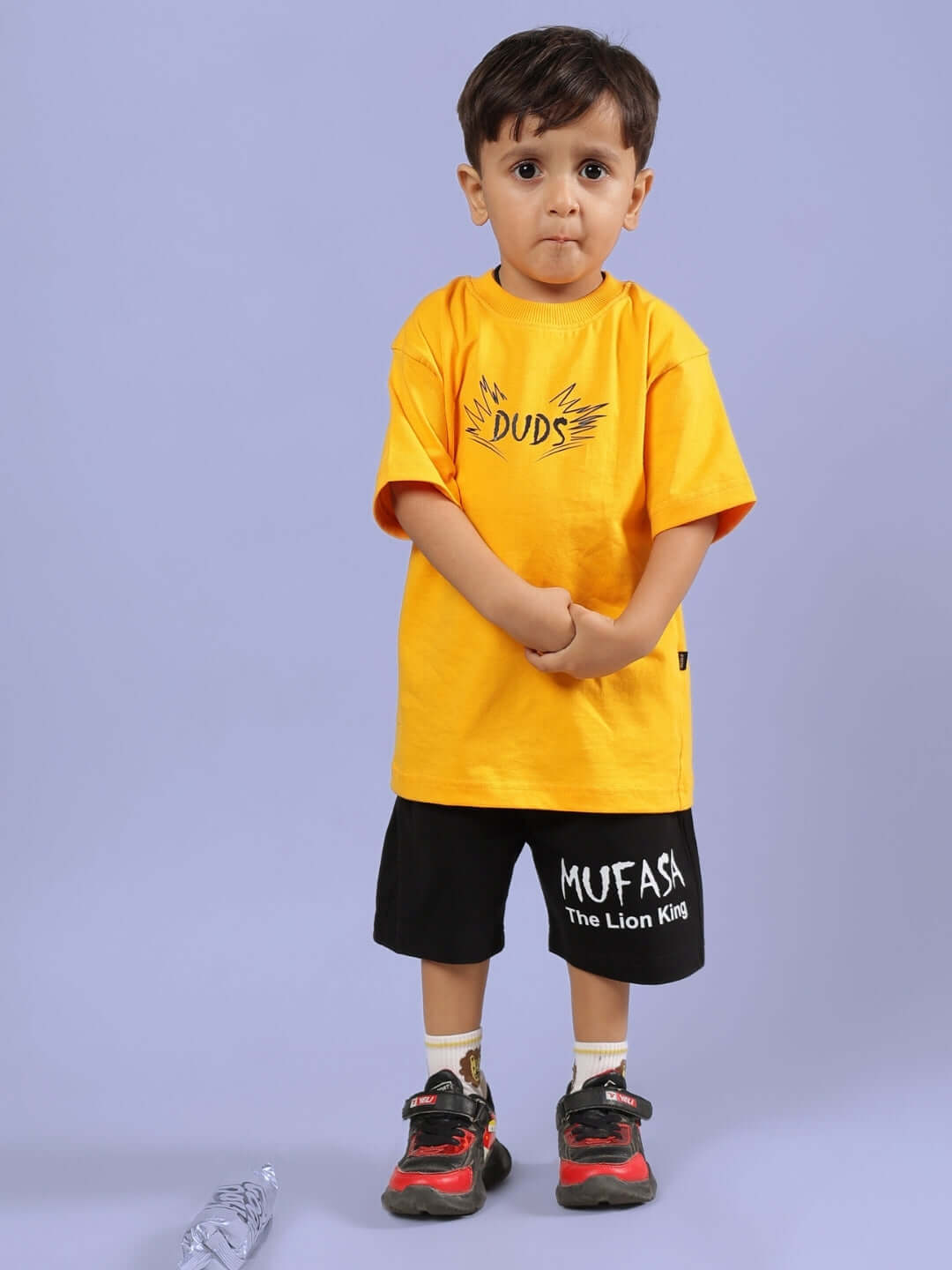 Child wearing MUFASA CO-ORD FOR BOYS & GIRLS MUSTARD-BLACK outfit by DUDS.