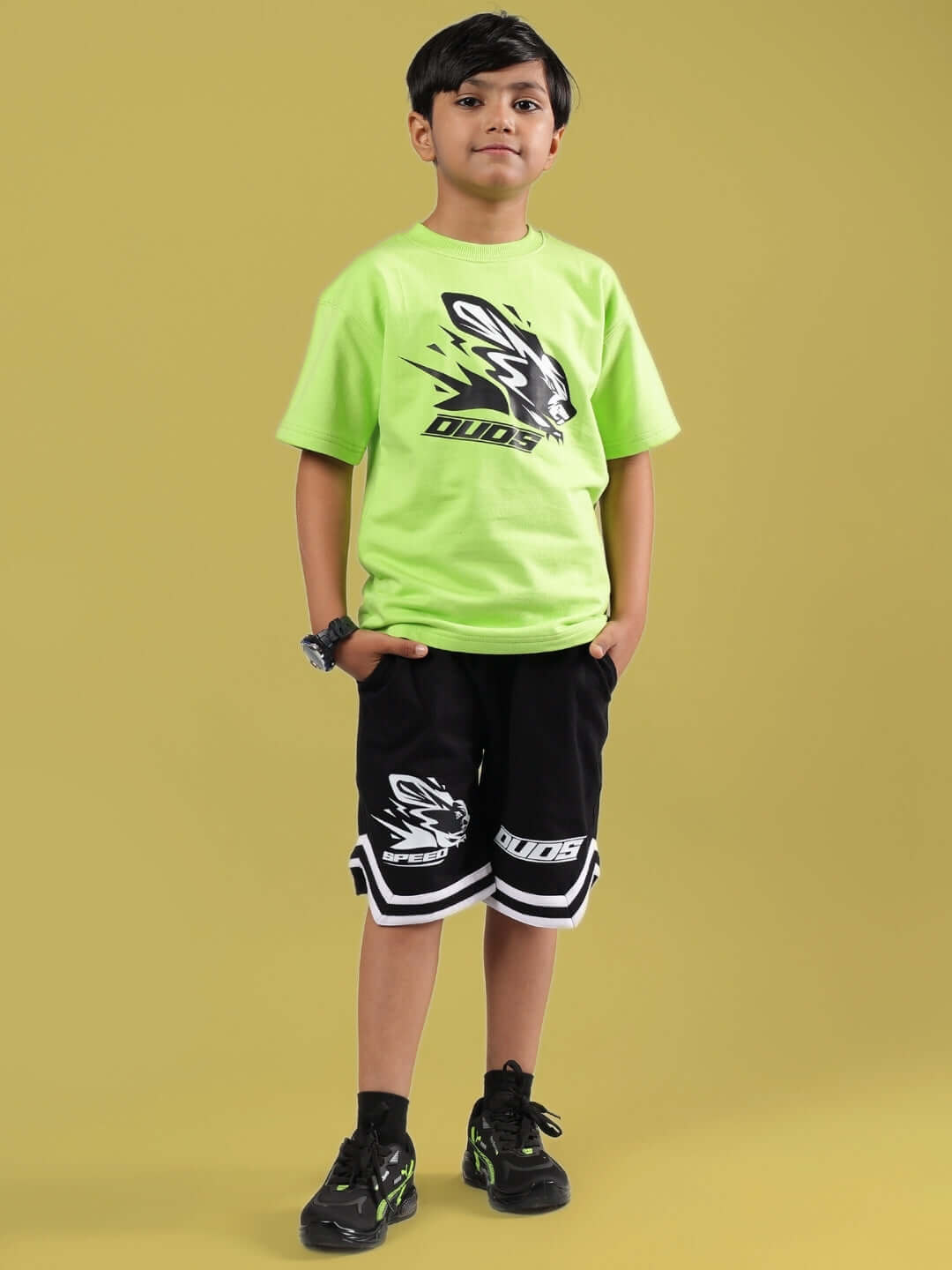 MUFFIN CO-ORD FOR BOYS & GIRLS NEON GREEN-BLACK outfit displayed on child