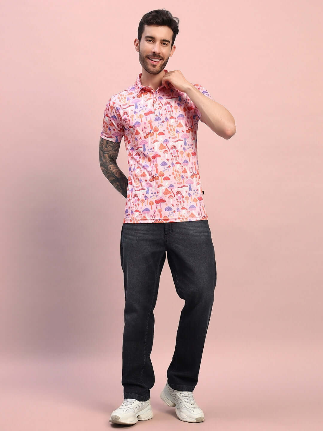 Mushroom print regular fit t-shirt in pink multi on male model, sports polyester fabric for casual wear. Cold machine wash recommended.