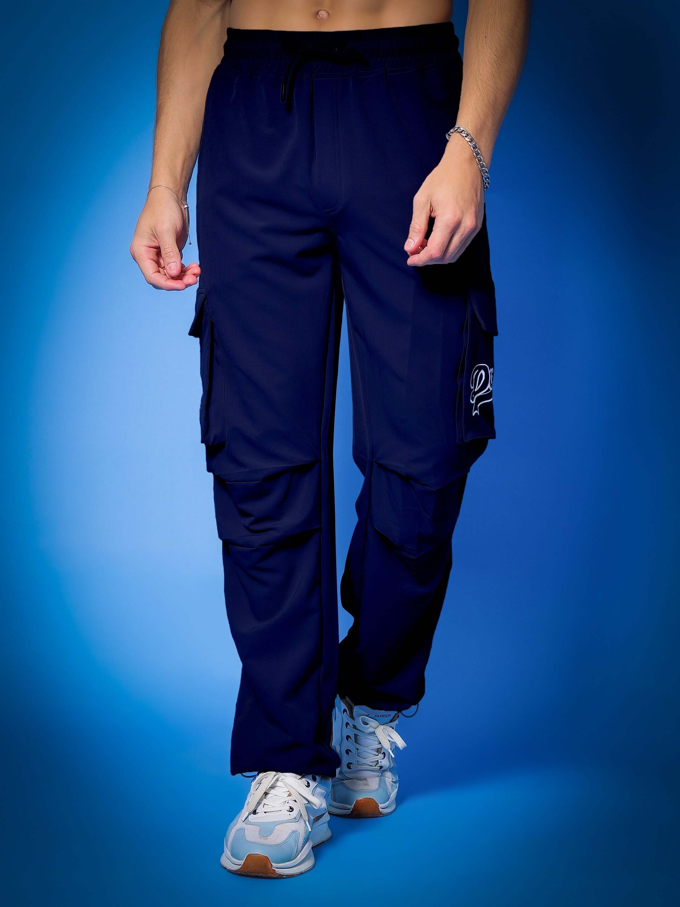 MYRIAD RELAXED FIT CARGO PANTS NAVY BLUE showcasing comfort and functionality with multiple pockets.