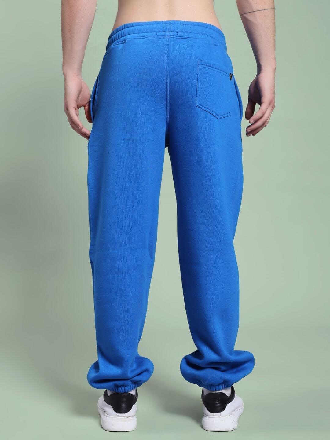 Back view of NATURE LINK FLEECE JOGGER ROYAL BLUE showcasing comfort and style in plush fleece, perfect for loungewear or casual outings.