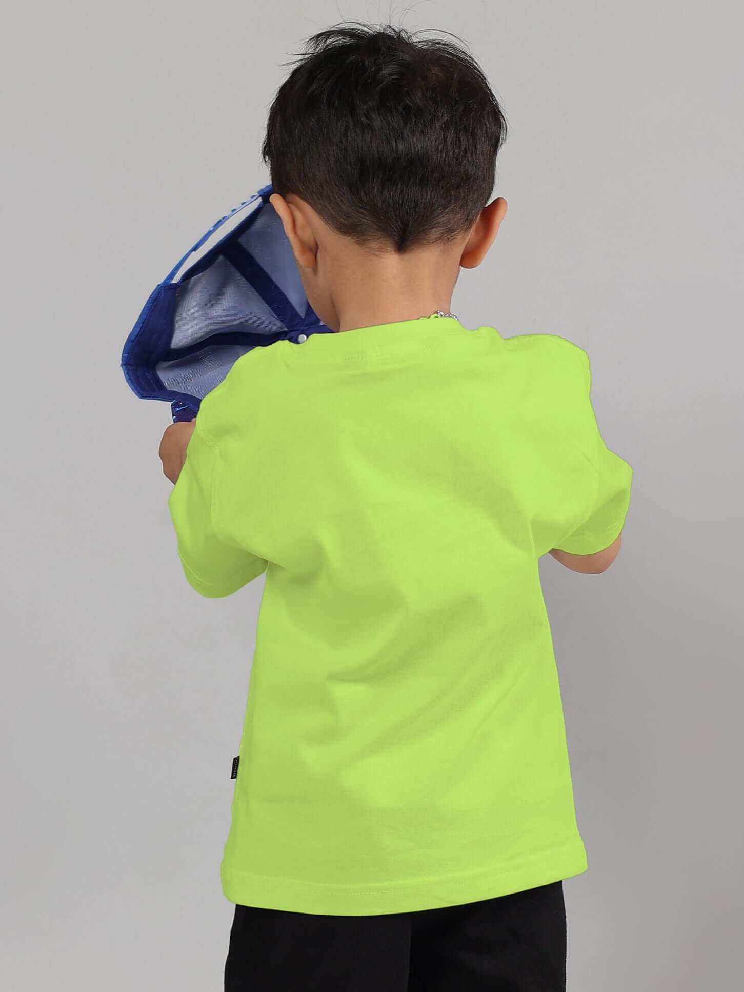 Child wearing neon green raccoon t-shirt for boys and girls, showcasing back view.