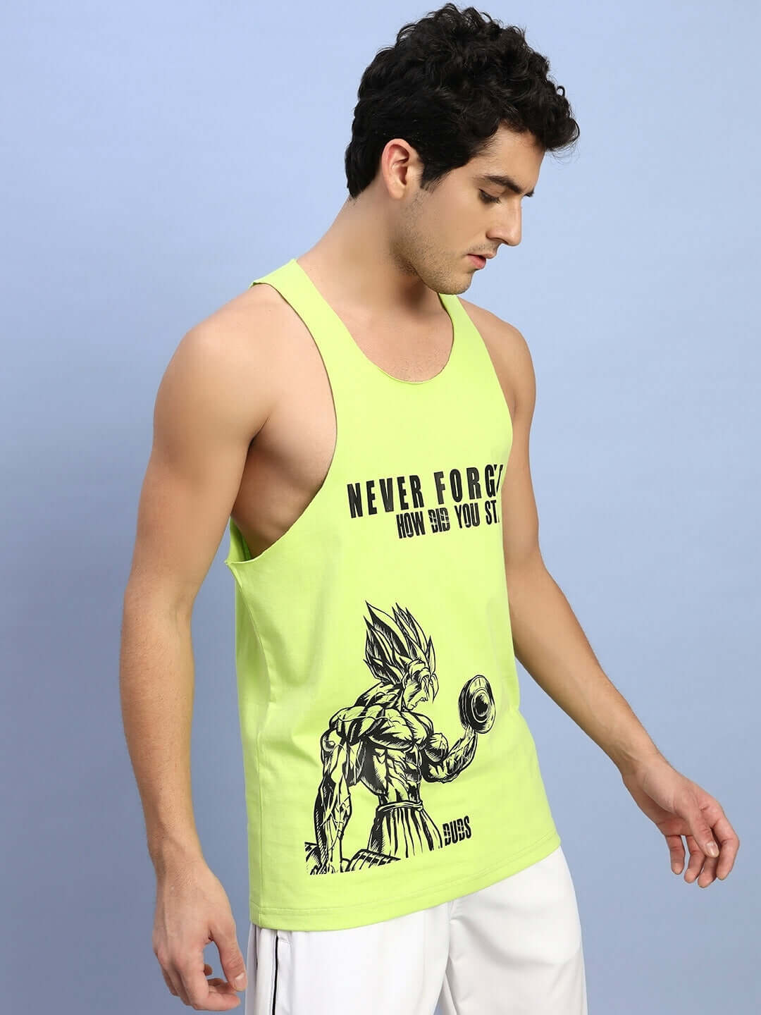Neon green gym T-shirt with 'Never Forget' print, featuring a muscular graphic design, ideal for fitness enthusiasts. DUDS custom fit option available.