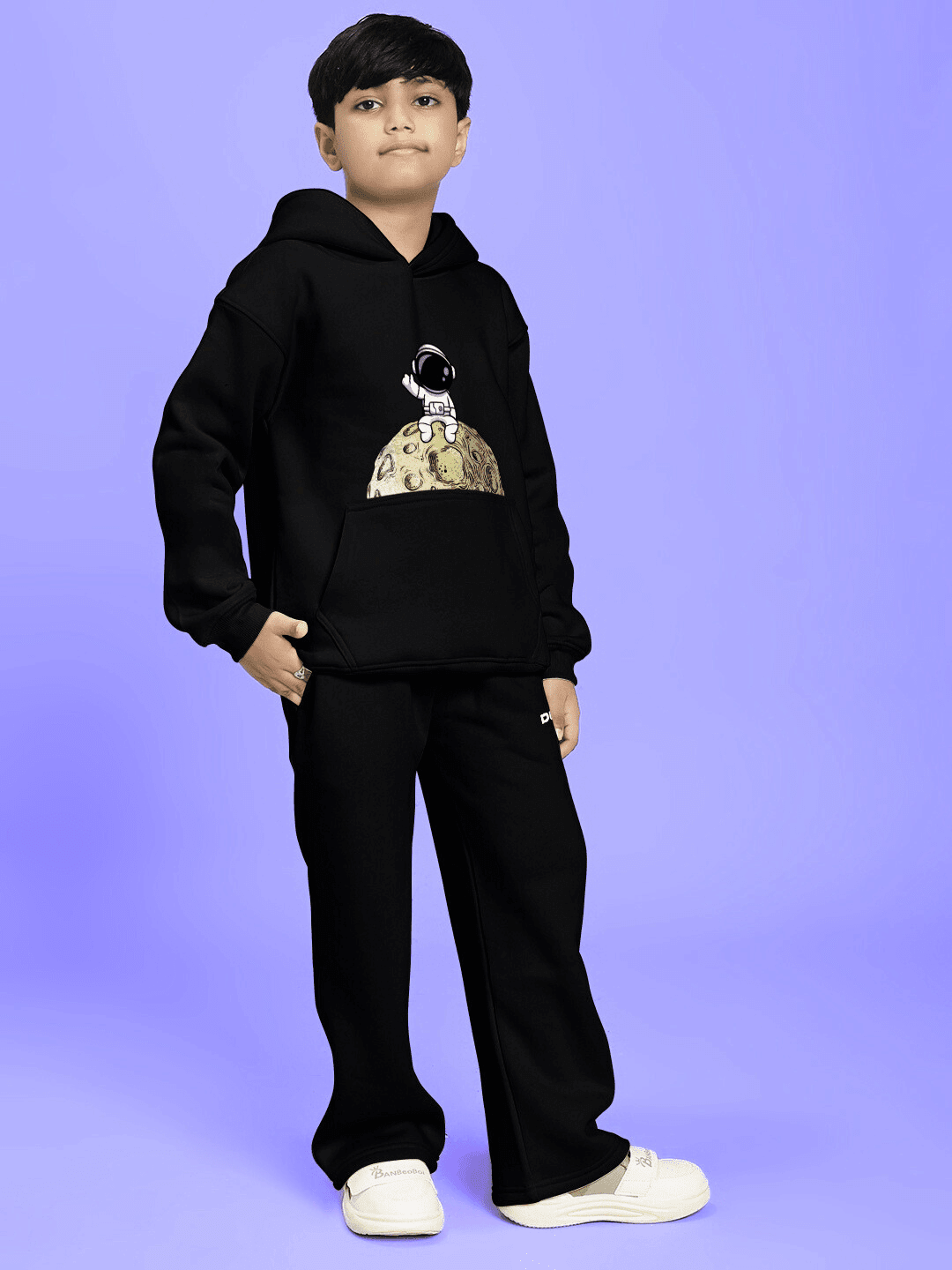 NEXT TO A MOON FLEECE CO-ORD FOR BOYS AND GIRLS BLACK outfit on a child, displaying comfort and style in soft fleece fabric. Versatile kids' co-ord.