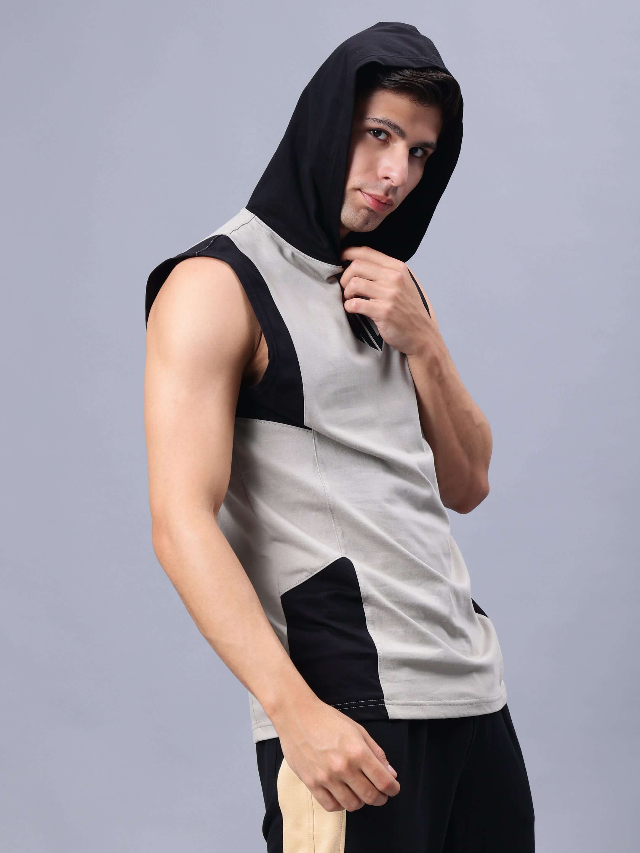 Alt Tag: Man wearing a grey-black Nirvana gym regular t-shirt with hood, ideal for custom fit and activewear enthusiasts.