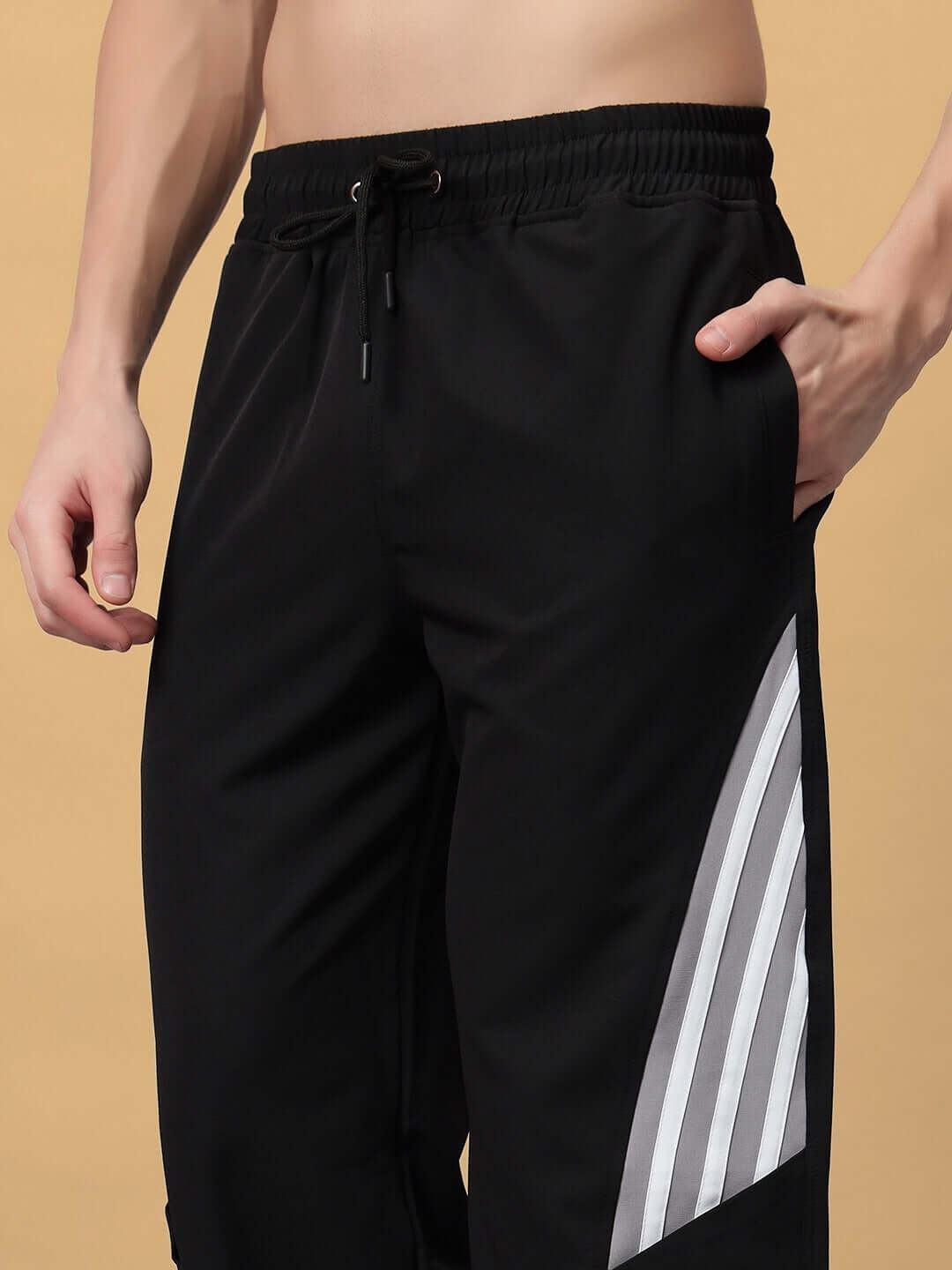 Black Nitro Relaxed Fit Cargo Pants with custom fit option shown in detail.