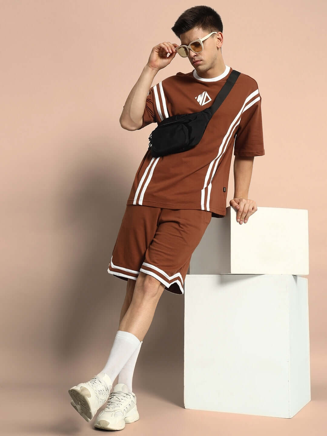 Model wearing Nordic Co-ord Set in brown, featuring premium cotton French terry lycra fabric; stylish and comfortable fashion ensemble.
