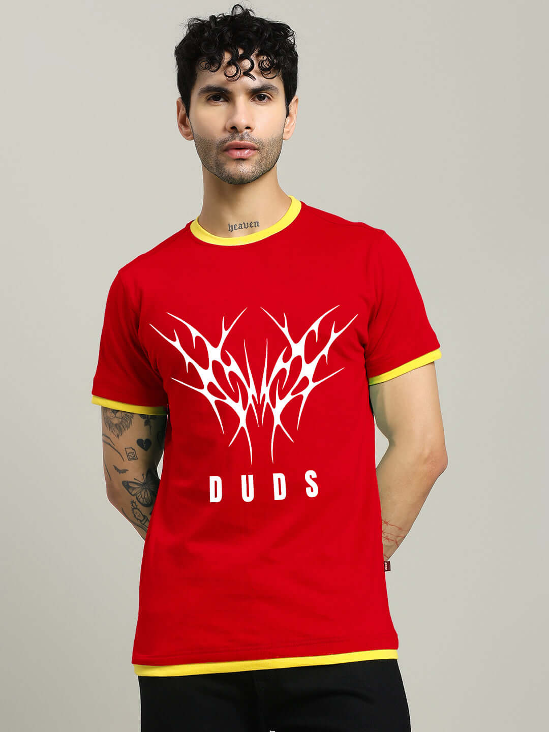 Model wearing NORIBA red regular fit T-shirt with graphic design, made from 100% cotton, 190 GSM, bio-washed for softness.