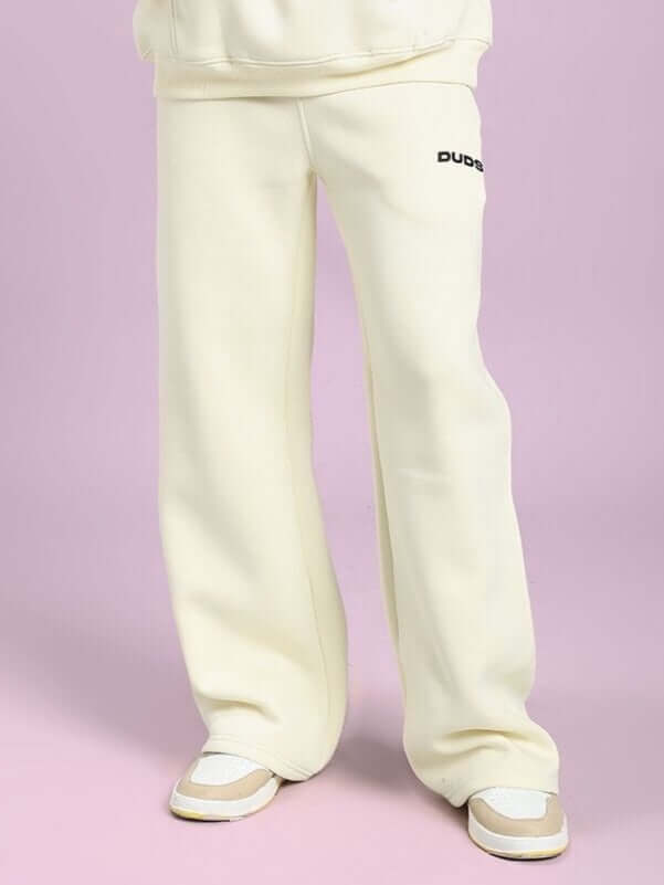 OCEAN BUDDIES JOGGER OFF-WHITE pants featuring playful sea life graphics, perfect for casual outings or lounging in comfort and style.