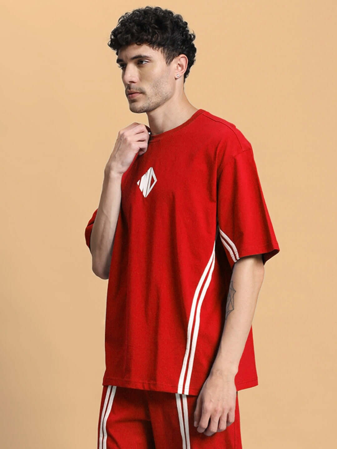 Model wearing OUTLOOK OVER-SIZED T-SHIRT RED with casual style and relaxed fit.