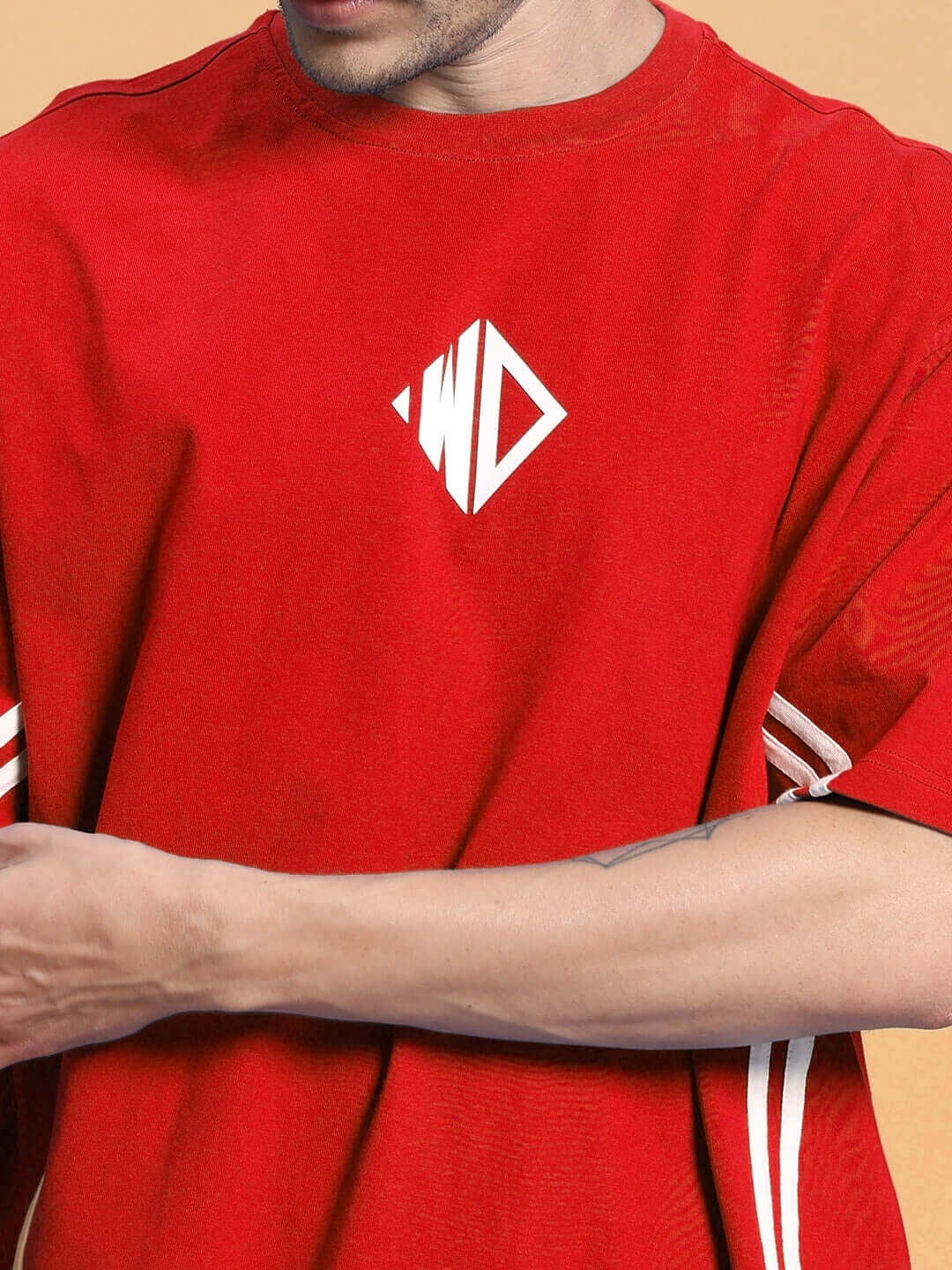 Close-up of OUTLOOK SUMMER CO-ORD SHORTS SET RED showing vibrant t-shirt with logo, perfect for a bold summer style.