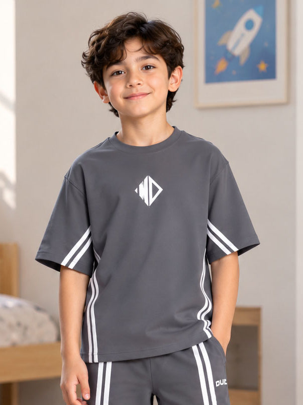 OUTLOOK T-SHIRT FOR BOYS GIRLS GREY worn by a smiling boy, casual comfortable fit, perfect for kids everyday wear and playtime