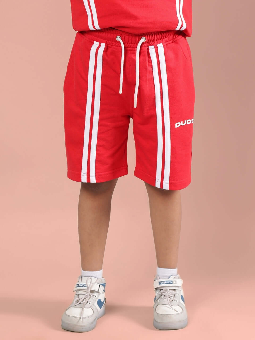 OUTLOOK SHORTS FOR BOYS GIRLS RED with white stripes, comfortable and stylish for active kids, regular fit and breathable fabric.