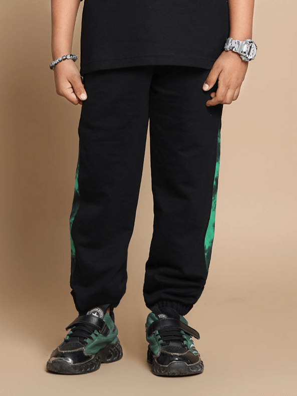 Child wearing Panda Joggers in green, suitable for boys and girls, featuring a comfortable fit with stylish design.