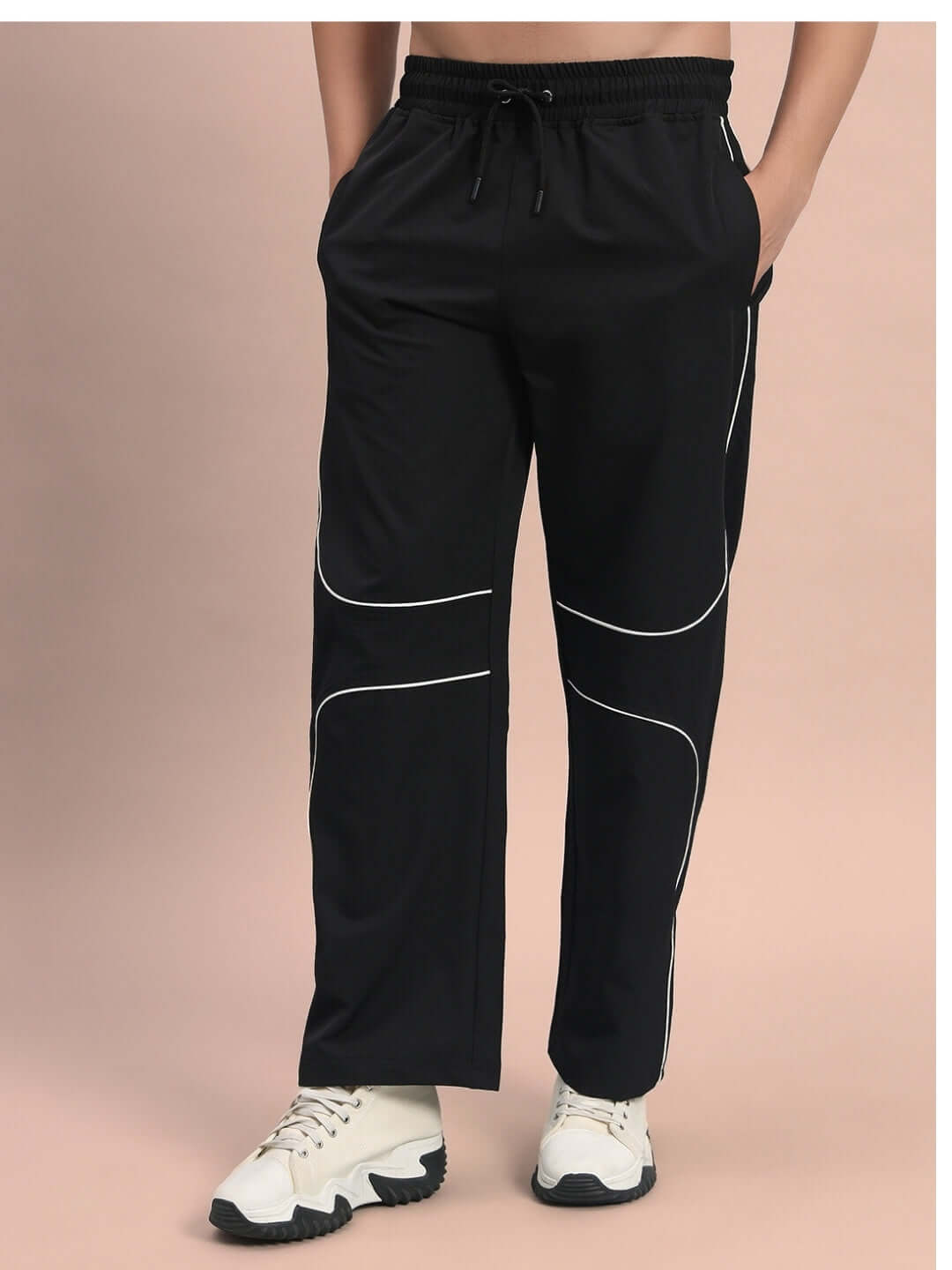 Parabolic parachute cargo pants in black with white piping details, featuring a customizable fit option for personalized comfort.