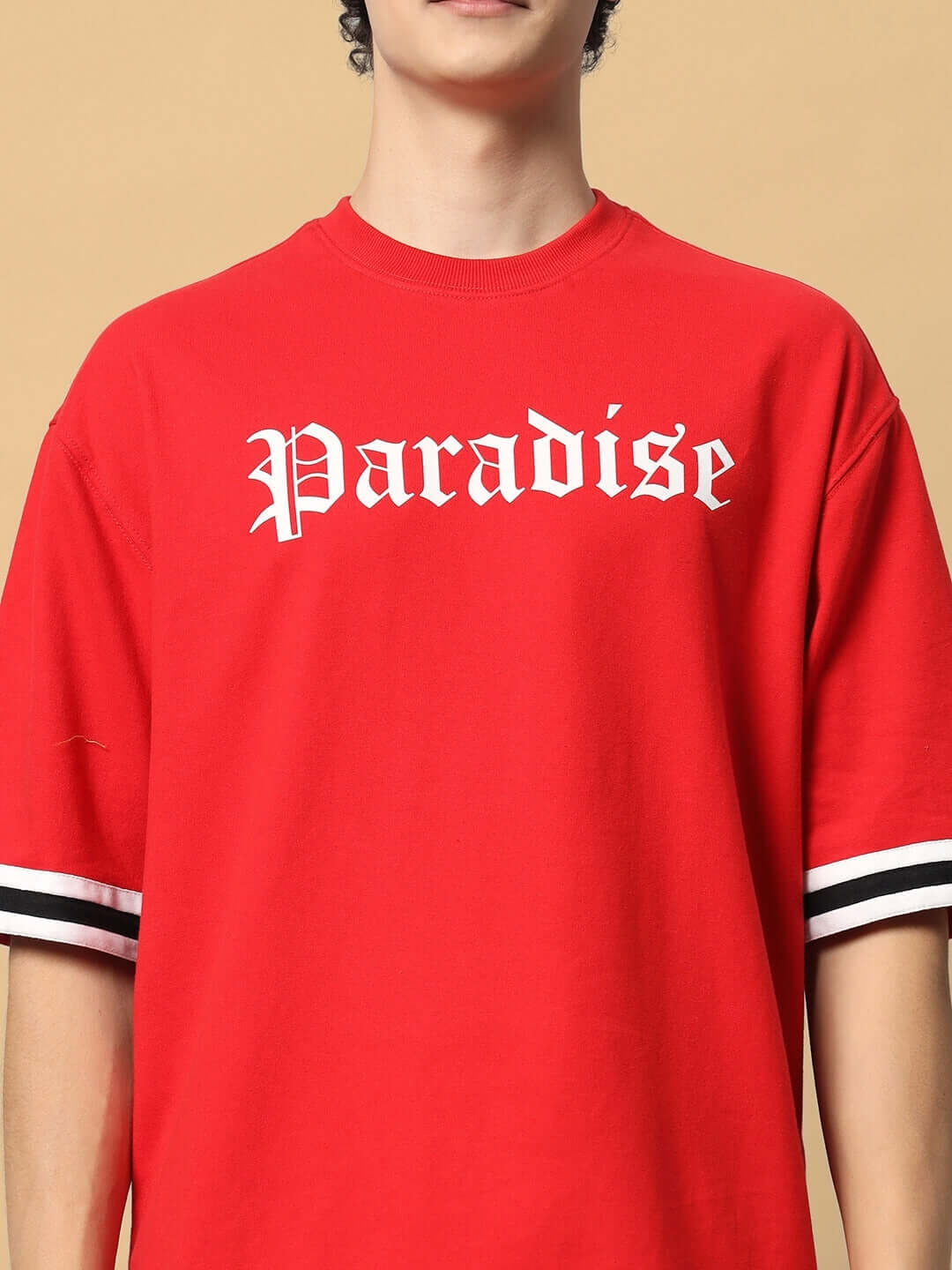 Red Paradise Colorblock Co-Ord Set with white lettering, made from premium cotton French Terry Lycra, ideal for casual wear. Manufactured in India.