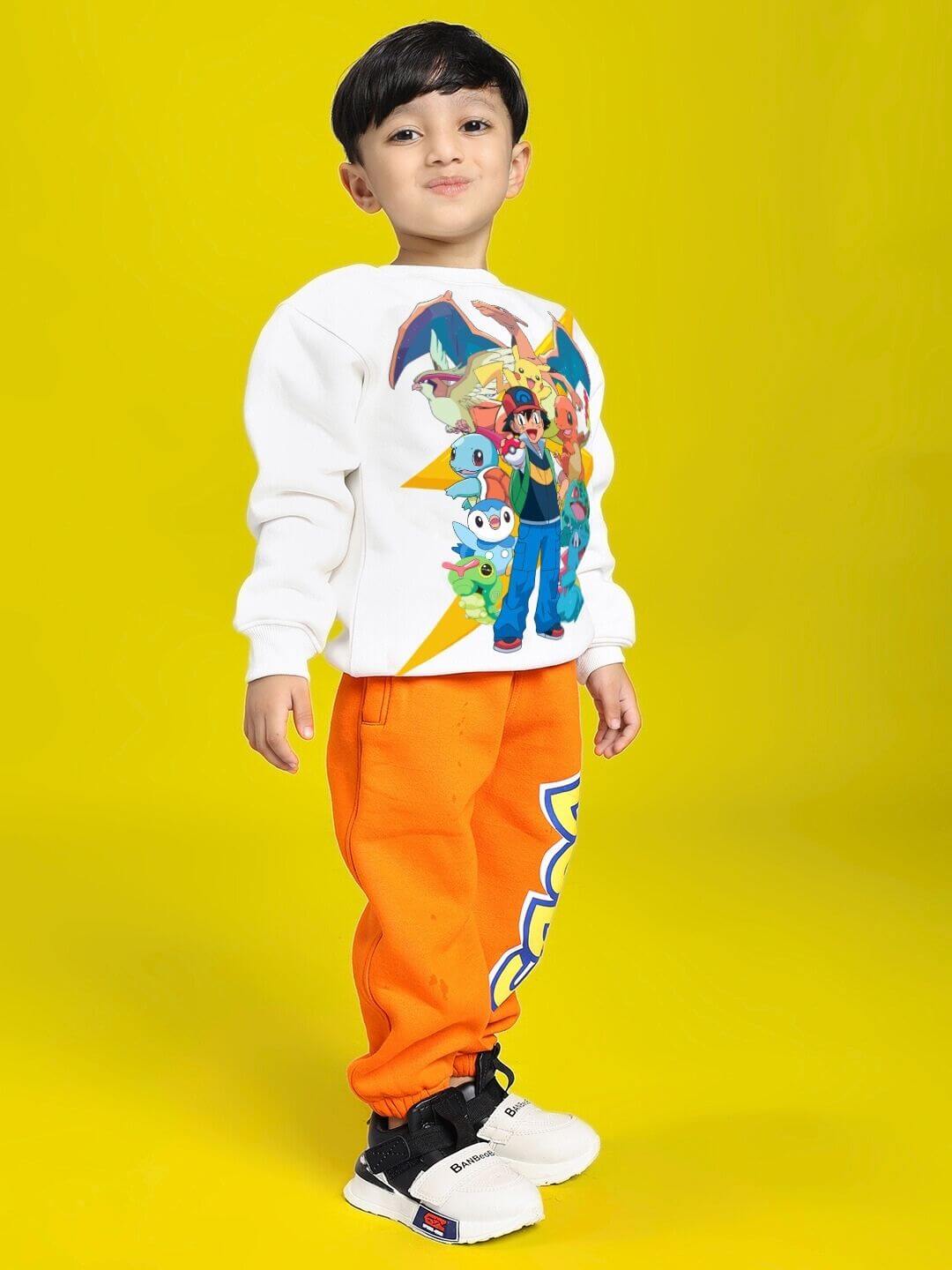 Child wearing POKEMON CO-ORD FOR BOYS AND GIRLS OFF-WHITE ORANGE with Pokémon illustrations, featuring a hoodie and joggers.