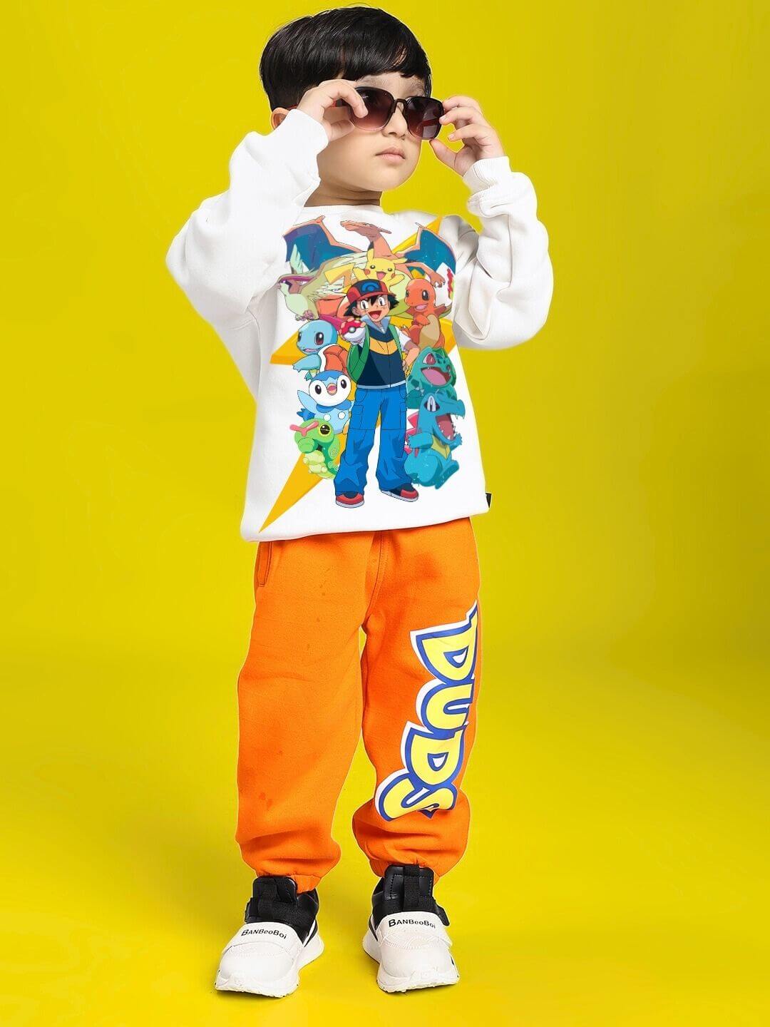 Child wearing POKEMON TOON FLEECE SWEATSHIRT FOR BOYS AND GIRLS OFF-WHITE with colorful characters, yellow background.