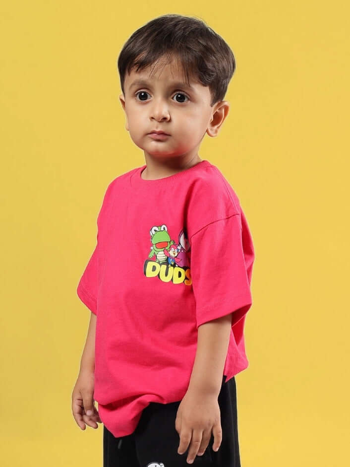 Child wearing Pororo Oversized T-Shirt for Boys Girls Pink, featuring a playful design, perfect for casual wear.