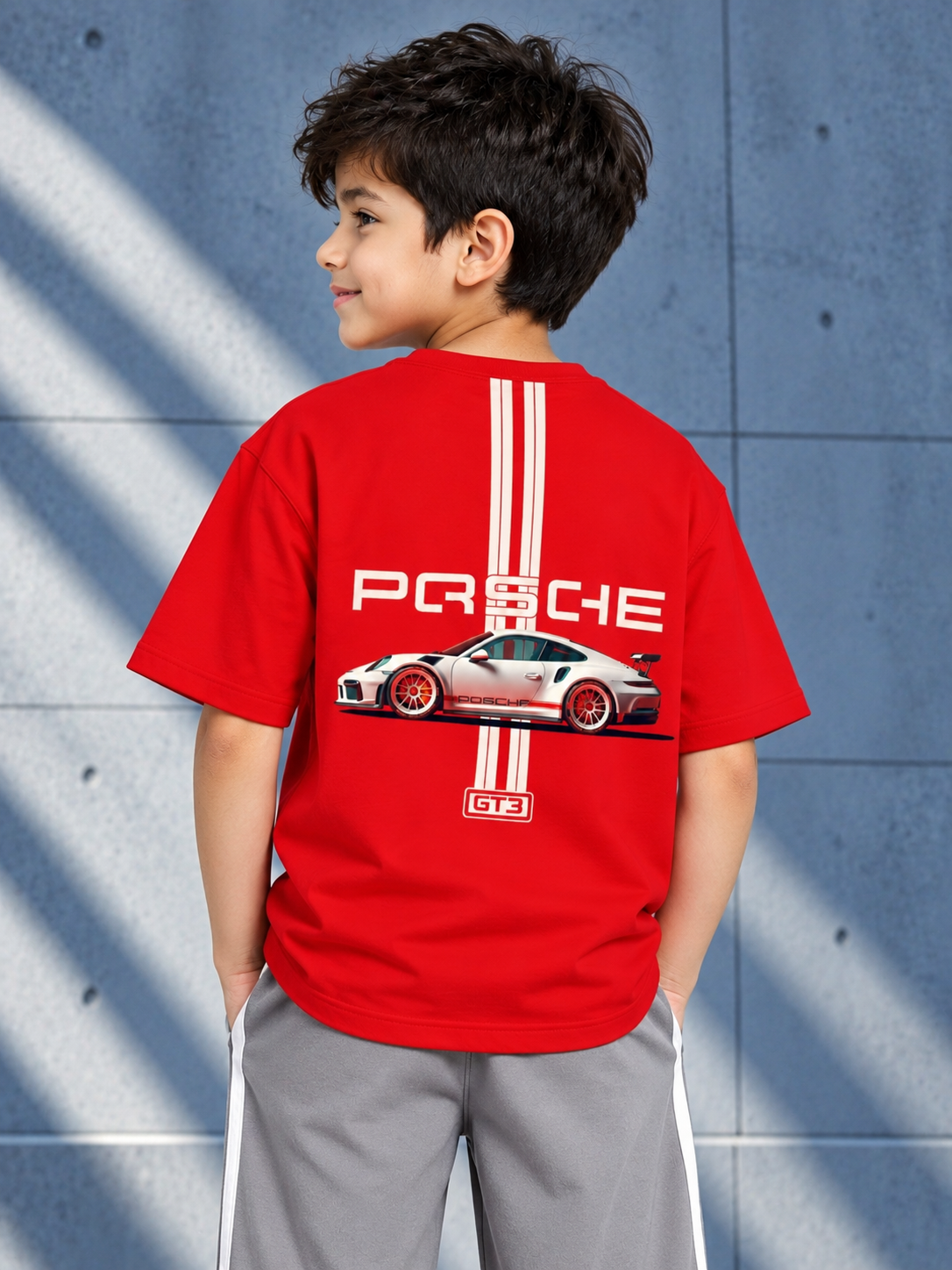 PORSCHE PRINTED OVER T-SHIRT FOR BOYS GIRLS RED worn by a boy, stylish casual kids fashion wear