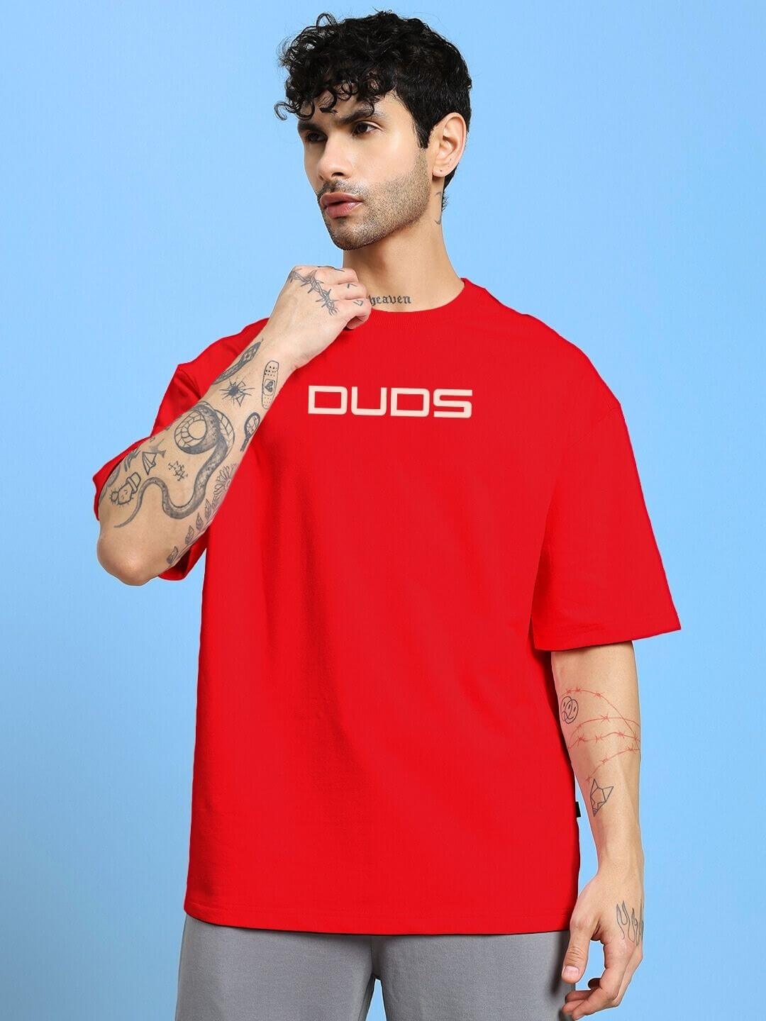 Man wearing PORSCHE PRINTED OVER-SIZED T-SHIRT RED, showcasing bold style and comfort.