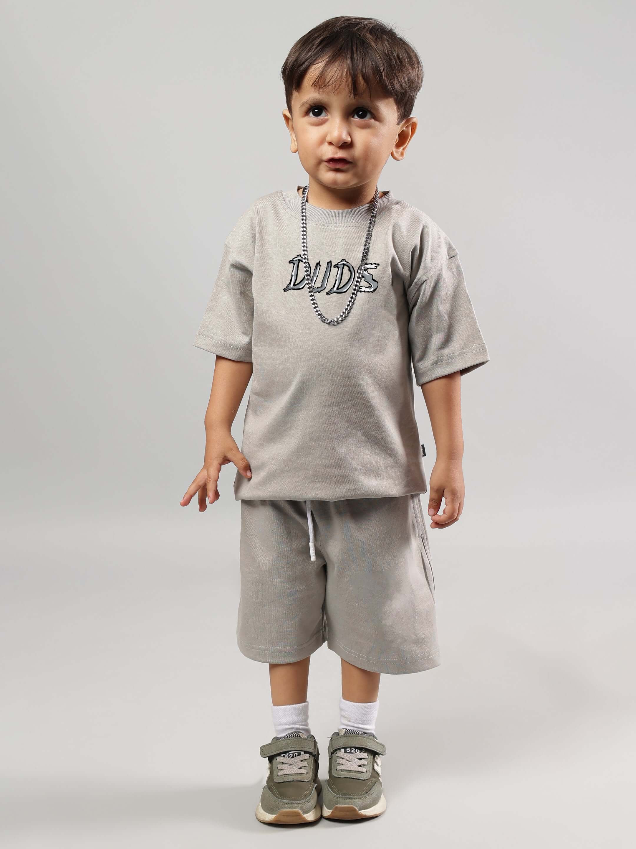 POSITIVE RABBIT KIDS CO-ORD FOR BOYS GIRLS GREY worn by a child, showcasing a stylish and comfortable grey outfit perfect for play and school.