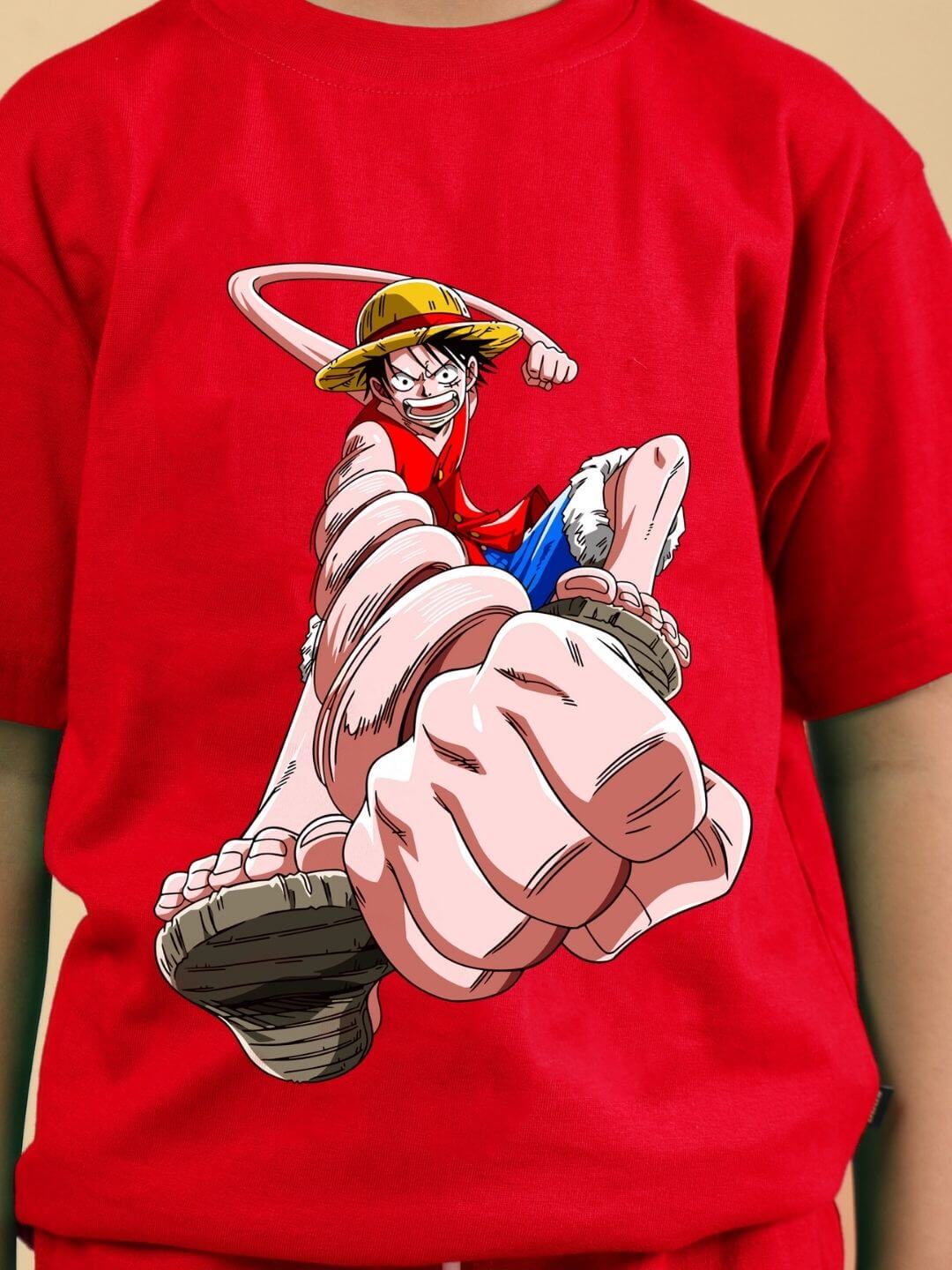 Child wearing red Power Punch co-ord set with cartoon graphic on T-shirt, designed for boys and girls, ideal for casual wear.