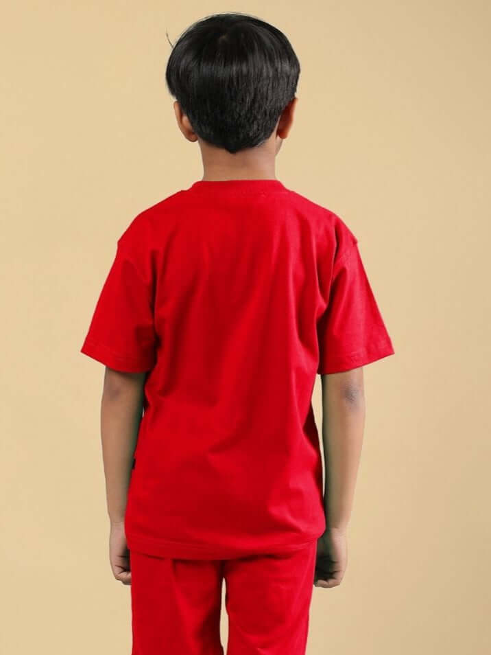 Boy wearing POWER PUNCH T-SHIRT FOR BOYS AND GIRLS RED from the back view.