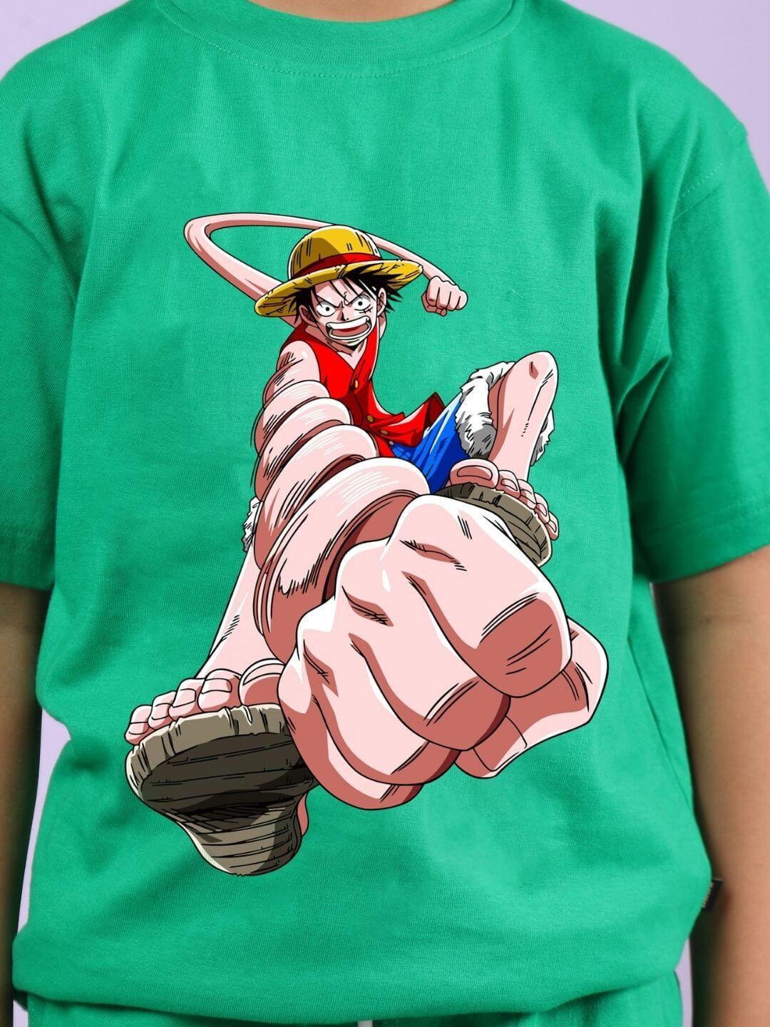 Boy wearing POWER PUNCH T-SHIRT FOR BOYS AND GIRLS GREEN featuring a bold cartoon print.