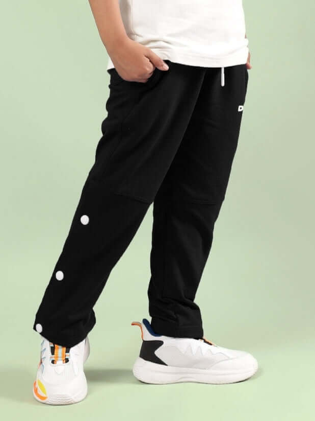 Child wearing RACER JOGGER FOR BOYS & GIRLS BLACK