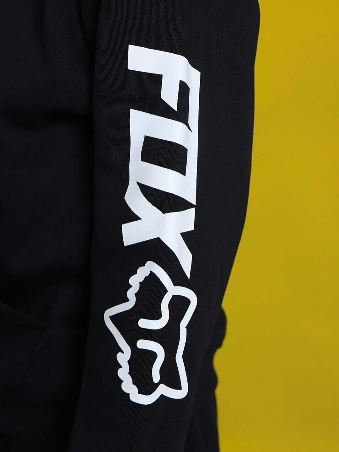 Close-up of black Racing Fox Fleece Co-Ord for Boys Girls with logo on sleeve.