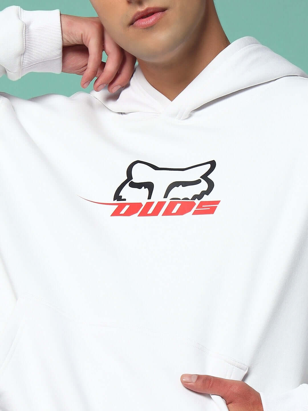 Close-up of RACING FOX COTTON FLEECE HOODIE WHITE showcasing logo and design details on model.