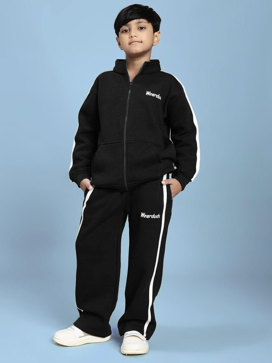 Child wearing RAPID STRIDE FLEECE CO-ORD FOR BOYS AND GIRLS BLACK, showcasing the bold black and sporty design for active kids.