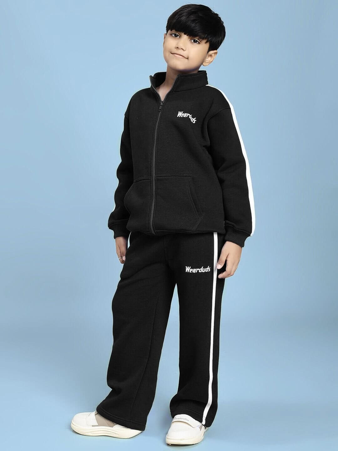 Child wearing Rapid Stride Fleece Co-Ord for Boys and Girls Black, featuring sporty design and comfort, perfect for active kids.