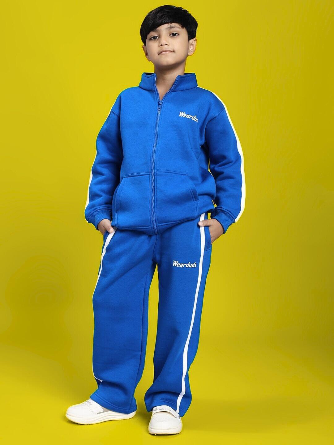 Boy wearing RAPID STRIDE FLEECE CO-ORD FOR BOYS AND GIRLS ROYAL BLUE, stylish and comfortable outfit with sporty design.