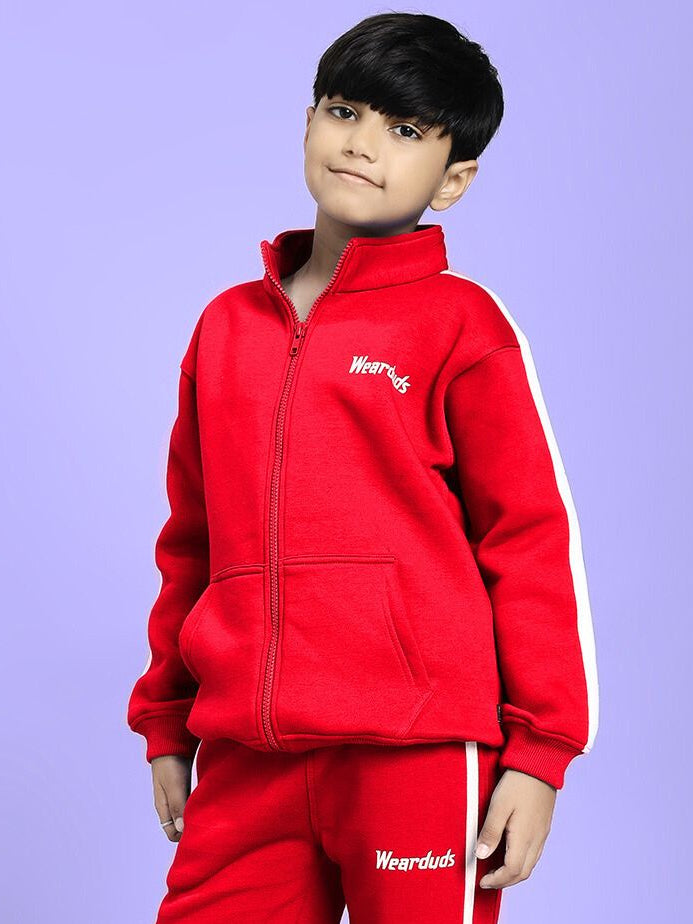 Boy wearing RAPID STRIDE FLEECE JACKET FOR BOYS AND GIRLS RED with white stripes, showcasing sporty style and practicality.