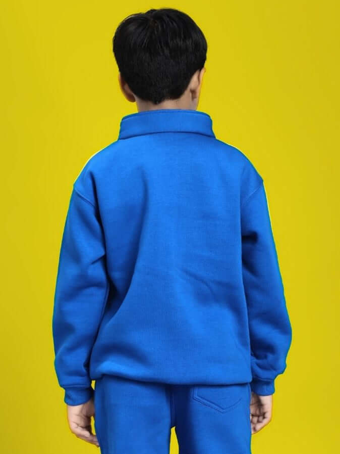 Child wearing RAPID STRIDE FLEECE JACKET FOR BOYS AND GIRLS ROYAL BLUE, shown from the back against a yellow background.