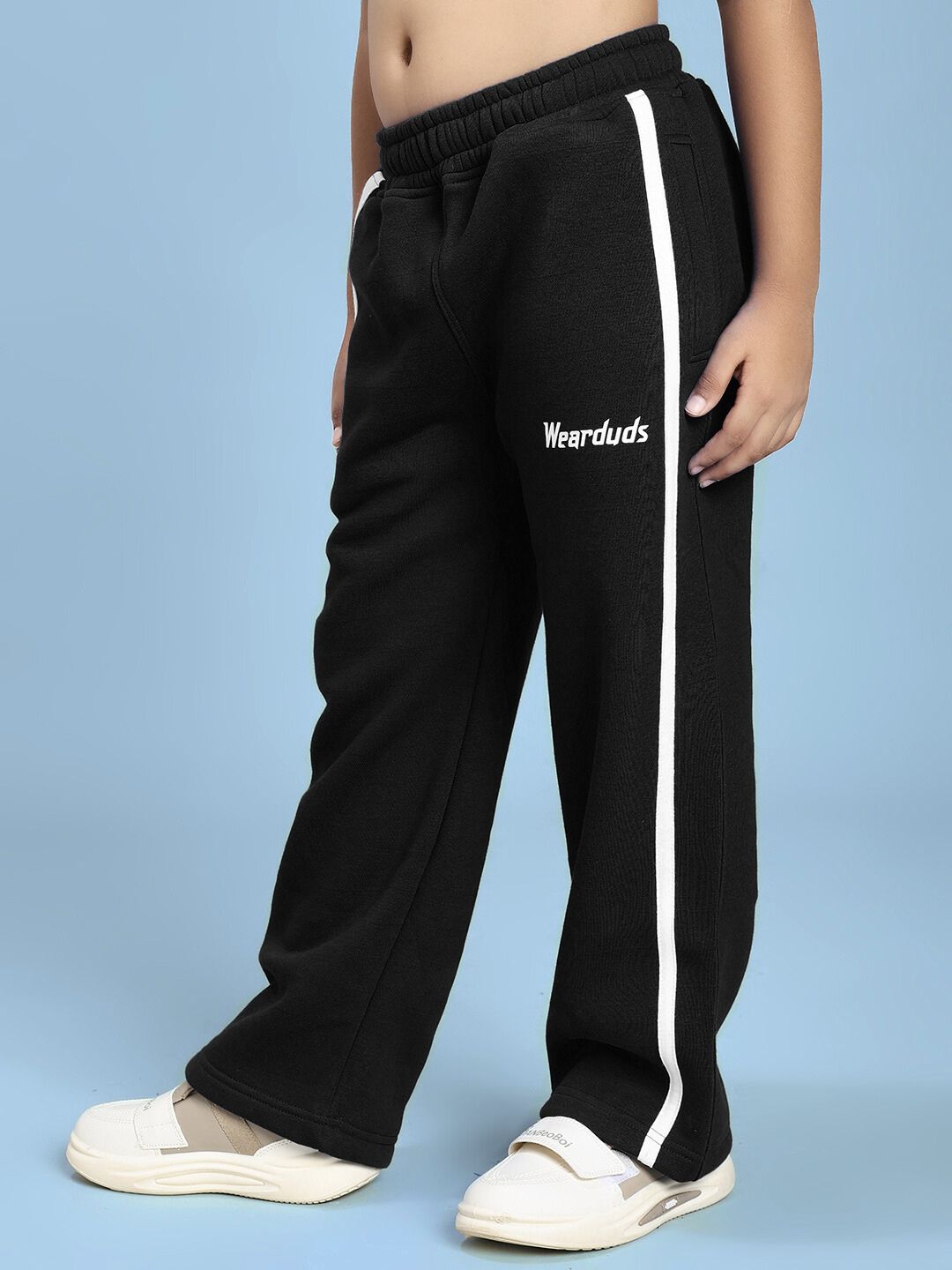Child wearing Rapid Stride Fleece Jogger for Boys and Girls Black showcasing comfort and sporty style.