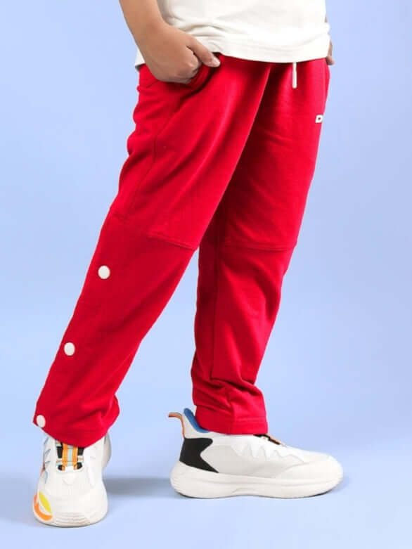 RACER JOGGER FOR BOYS & GIRLS RED with white accents, perfect for active wear with customizable fit option.
