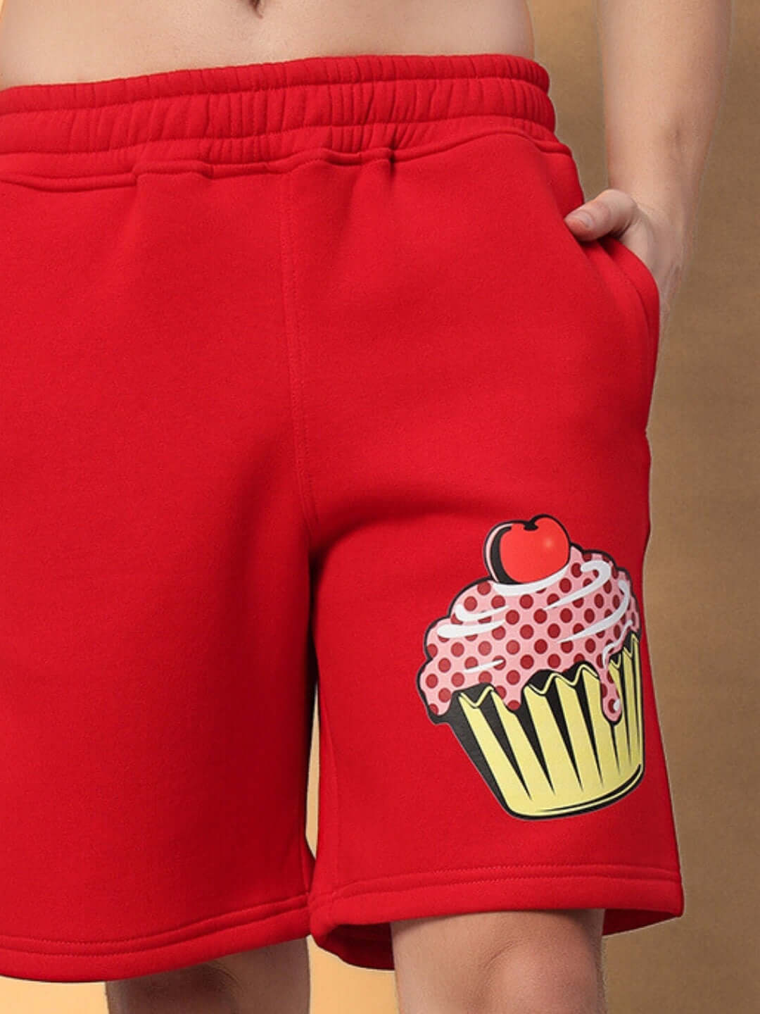 CUPCAKE COTTON FLEECE CO-ORD RED shorts with cupcake design, showcasing trendy streetwear style and comfort in vibrant red.
