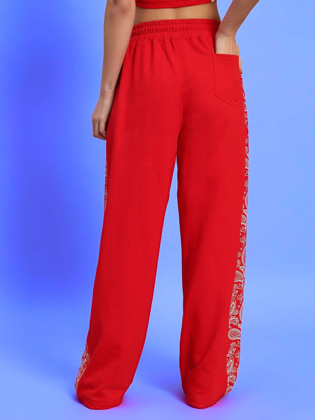 Back view of Women's Waltz Relaxed Fit Joggers in red with paisley side design.