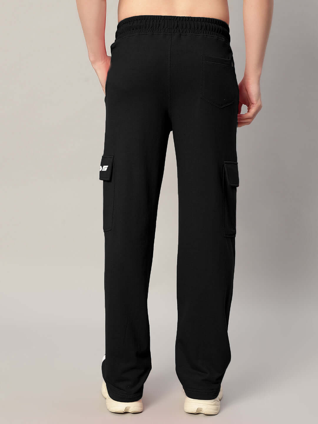 Back view of REDROIT black joggers with relaxed fit and five pockets, perfect for custom fit orders by DUDS.
