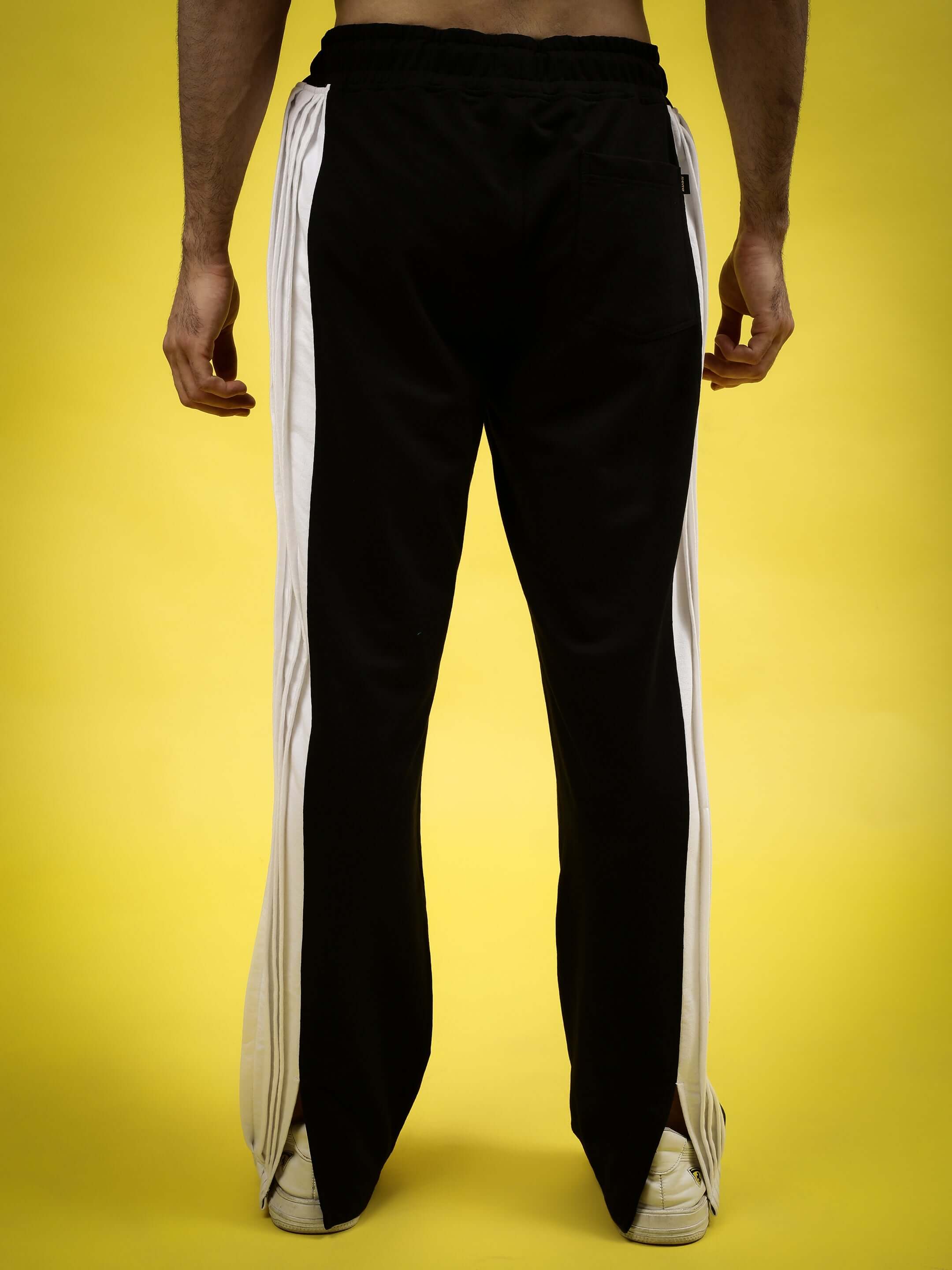 Back view of REGAL BAGGY JOGGERS in black and white, made to order by DUDS. Custom Fit available for prepaid orders, shipping in 7-10 days.