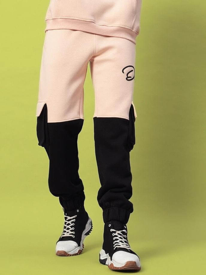 REGIMENT FLEECE CO-ORD BEIGE BLACK joggers showcased in modern streetwear style, emphasizing warmth and style.